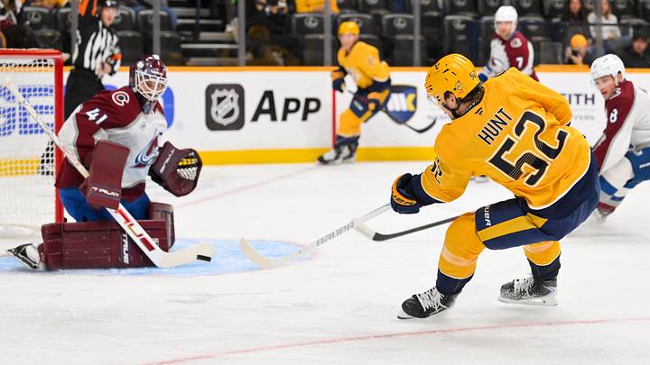 Oct 25, 2026; Nashville, Tennessee, USA;  Colorado Avalanche goaltender Scott Wedgewood (41) blocks the shot of Nashville Predators defenseman Daemon Hunt (52) during the first period at Bridgestone Arena.  Mandatory Credit: Steve Roberts-Imagn Images