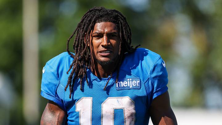 Detroit Lions running back Isiah Pacheco (10) walks off the field