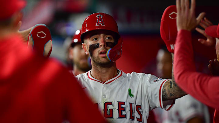 May 24, 2025; Anaheim, California, USA; Los Angeles Angels shortstop Zach Neto (9) is greeted after scoring a run against the Miami Marlins during the fourth inning at Angel Stadium. Mandatory Credit: Gary A. Vasquez-Imagn Images May 24, 2025; Anaheim, California, USA; Los Angeles Angels shortstop Zach Neto (9) is greeted after scoring a run against the Miami Marlins during the fourth inning at Angel Stadium. Mandatory Credit: Gary A. Vasquez-Imagn Images