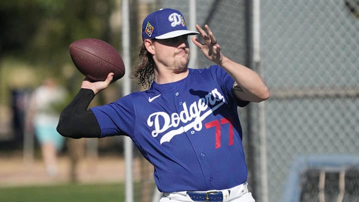 Feb 14, 2026; Glendale, AZ, USA; Los Angeles Dodgers pitcher River Ryan warms up during spring training camp. Mandatory Credit: Rick Scuteri-Imagn Images