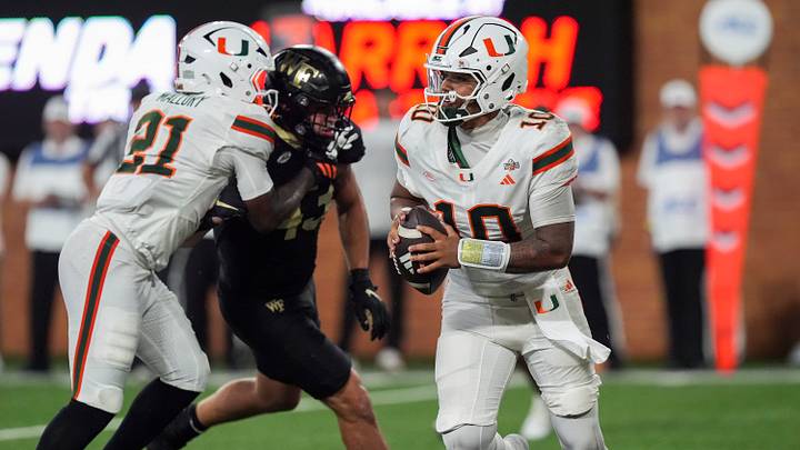 Sep 18, 2026; Winston-Salem, North Carolina, USA; Miami (FL) Hurricanes quarterback Darian Mensah (10) rolls out to pass against the Wake Forest Demon Deacons during the second half at Allegacy Federal Credit Union Stadium. Mandatory Credit: Jim Dedmon-Imagn Images Sep 18, 2026; Winston-Salem, North Carolina, USA; Miami (FL) Hurricanes quarterback Darian Mensah (10) rolls out to pass against the Wake Forest Demon Deacons during the second half at Allegacy Federal Credit Union Stadium. Mandatory Credit: Jim Dedmon-Imagn Images