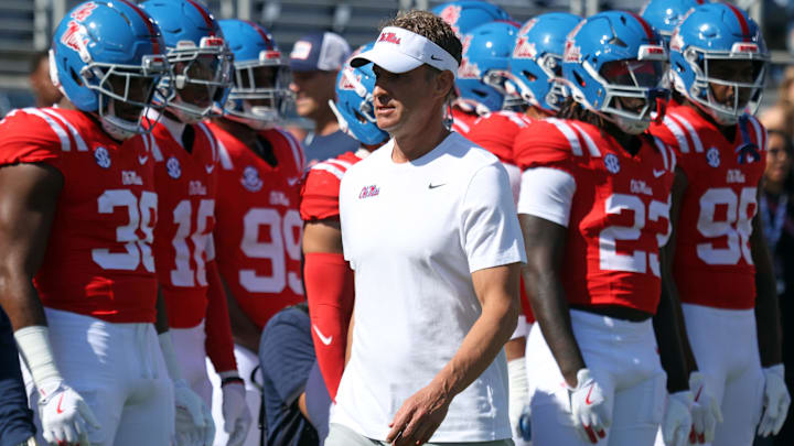 Oct 11, 2025; Oxford, Mississippi, USA; Mississippi Rebels head coach Lane Kiffin looks on during warm ups prior to the game against the Washington State Cougars at Vaught-Hemingway Stadium. Mandatory Credit: Petre Thomas-Imagn Images