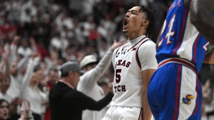 Texas Tech's guard Darrion Williams (5) celebrates his 3-pointer against Kansas in a Big 12 basketball game, Monday, Feb. 12, 2024, at United Supermarkets Arena. Texas Tech's guard Darrion Williams (5) celebrates his 3-pointer against Kansas in a Big 12 basketball game, Monday, Feb. 12, 2024, at United Supermarkets Arena.