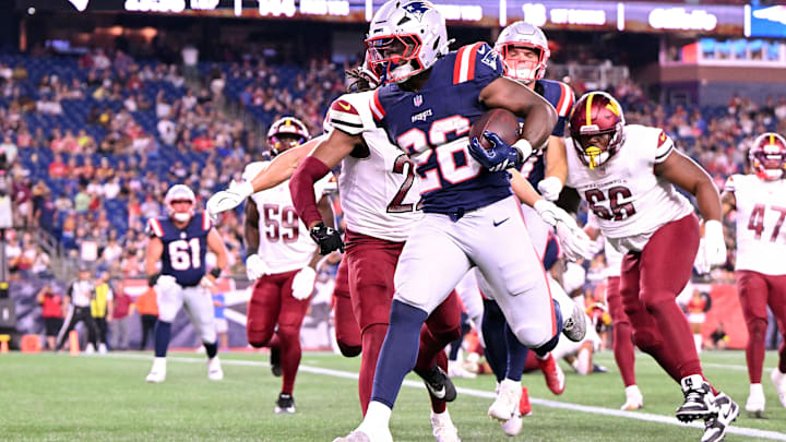 Aug 8, 2025; Foxborough, Massachusetts, USA; New England Patriots running back Terrell Jennings (26) scores a touchdown against the Washington Commanders during the second half at Gillette Stadium. Mandatory Credit: Brian Fluharty-Imagn Images