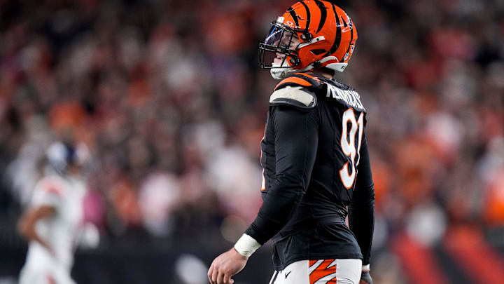 Cincinnati Bengals defensive end Trey Hendrickson (91) smiles after forcing the Broncos to punt during overtime of the NFL Week 17 game between the Cincinnati Bengals and the Denver Broncos at Paycor Stadium in downtown Cincinnati on Saturday, Dec. 28, 2024. The Bengals took a 30-24 win in overtime to remain in the post season chase. Cincinnati Bengals defensive end Trey Hendrickson (91) smiles after forcing the Broncos to punt during overtime of the NFL Week 17 game between the Cincinnati Bengals and the Denver Broncos at Paycor Stadium in downtown Cincinnati on Saturday, Dec. 28, 2024. The Bengals took a 30-24 win in overtime to remain in the post season chase.