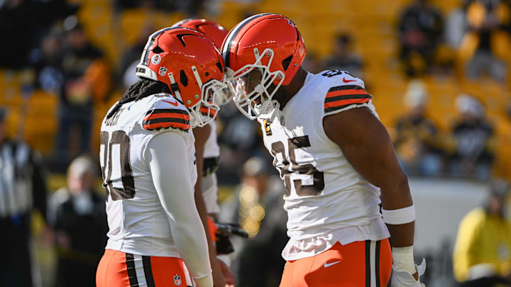 Dec 8, 2024; Pittsburgh, Pennsylvania, USA; Cleveland Browns defensive end Myles Garrett (95) and linebacker Devin Bush (30) warm up for a game against the Cleveland Browns at Acrisure Stadium.