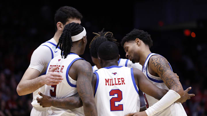 Mar 18, 2026; Dayton, OH, USA; The SMU Mustangs huddle together in the second half against the Miami (OH) RedHawks during a first four game of the Men's 2026 NCAA Tournament at University of Dayton Arena. Mar 18, 2026; Dayton, OH, USA; The SMU Mustangs huddle together in the second half against the Miami (OH) RedHawks during a first four game of the Men's 2026 NCAA Tournament at University of Dayton Arena.