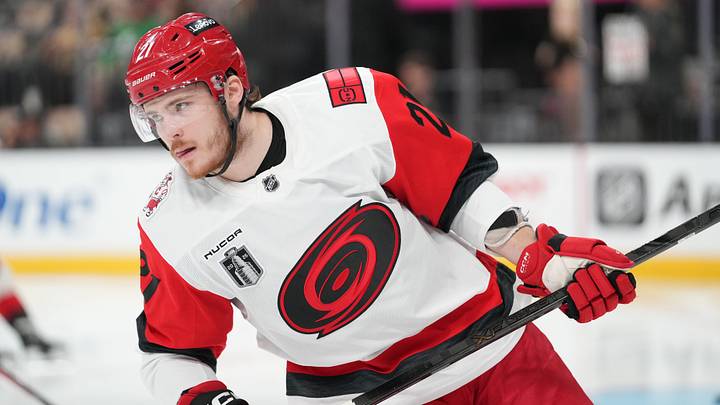 Jun 9, 2026; Las Vegas, Nevada, USA;  Carolina Hurricanes defenseman Alexander Nikishin (21) warms up before game four of the 2026 Stanley Cup Final against the Vegas Golden Knights at T-Mobile Arena. Mandatory Credit: Lucas Peltier-Imagn Images