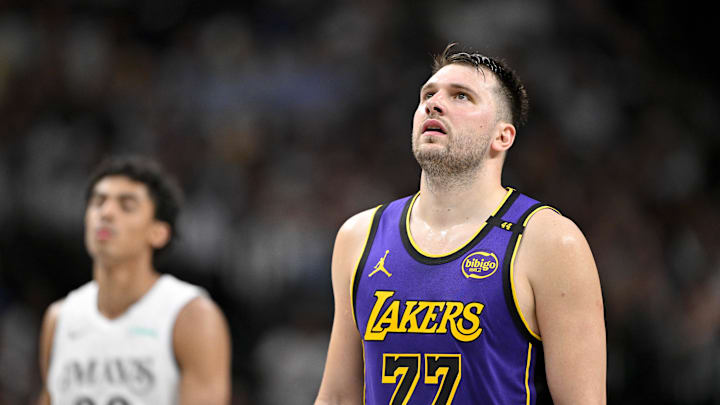 Dallas Mavericks guard Max Christie and Los Angeles Lakers guard Luka Doncic during the game between the Dallas Mavericks and the Los Angeles Lakers at American Airlines Center. Mandatory Credit: Jerome Miron-Imagn Images