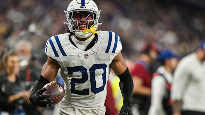Nov 3, 2024; Minneapolis, Minnesota, USA; Indianapolis Colts safety Nick Cross (20) returns an interception off Minnesota Vikings quarterback Sam Darnold (not pictured) during the fourth quarter at U.S. Bank Stadium. Mandatory Credit: Jeffrey Becker-Imagn Images