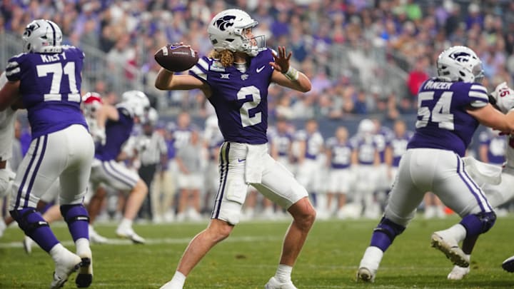Kansas State quarterback Avery Johnson (2) throws a pass against Rutgers during second half of the Rate Bowl at Chase Field on Dec. 26, 2024, in Phoenix.
