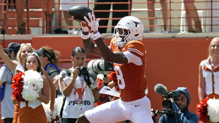 Texas Longhorns wide receiver Cam Coleman (8) catches a pass for a touchdown during the first quarter against the Texas State Bobcats at Darrell K Royal-Texas Memorial Stadium. Texas Longhorns wide receiver Cam Coleman (8) catches a pass for a touchdown during the first quarter against the Texas State Bobcats at Darrell K Royal-Texas Memorial Stadium.