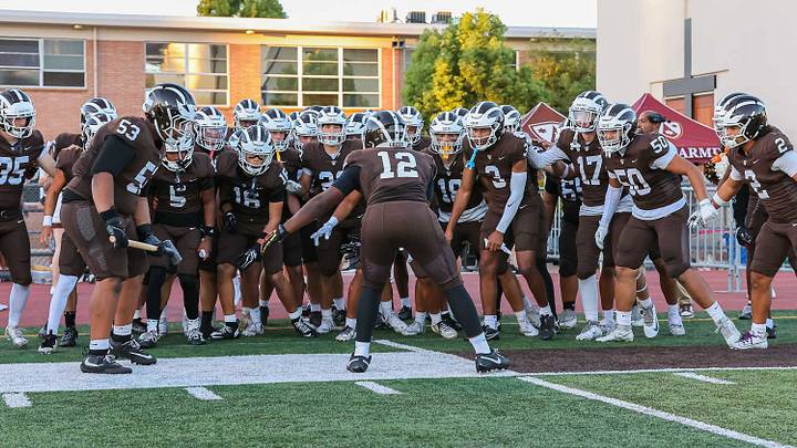 Crespi football gets pumped up before running onto the field to take on St. Francis at home.