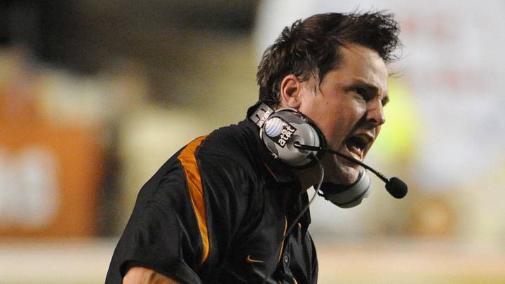 Texas Longhorns defensive coach Will Muschamp reacts to a call against the Wyoming Cowboys during the fourth quarter