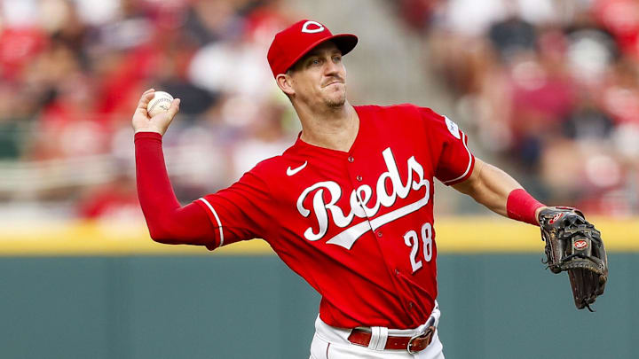 Jun 24, 2023; Cincinnati, Ohio, USA; Cincinnati Reds third baseman Kevin Newman (28) throws to first