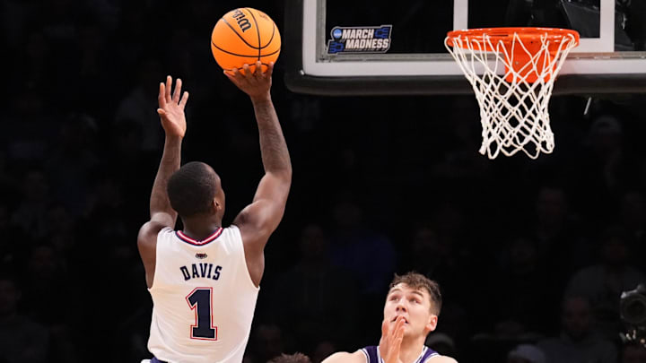 March 22, 2024, Brooklyn, NY, USA;  Florida Atlantic Owls guard Johnell Davis (1) shoots over