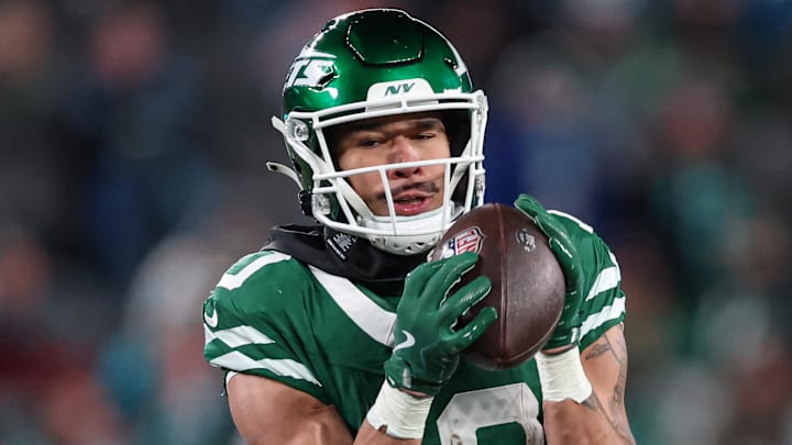 Jan 5, 2025; East Rutherford, New Jersey, USA; New York Jets wide receiver Allen Lazard (10) catches the ball during the second half against the Miami Dolphins at MetLife Stadium. Mandatory Credit: Vincent Carchietta-Imagn Images