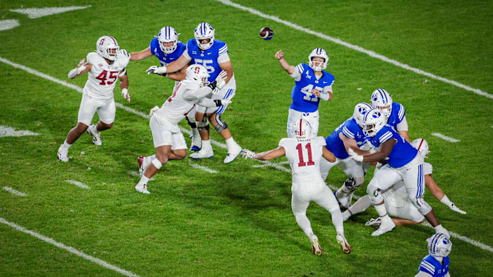 BYU quarterback Bear Bachmeier attempts a throw against Stanford