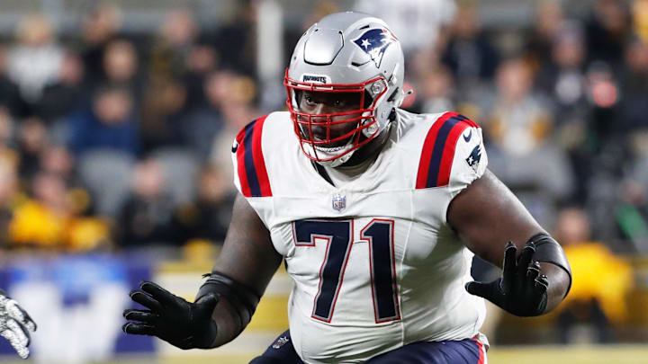 Dec 7, 2023; Pittsburgh, Pennsylvania, USA;  New England Patriots guard Mike Onwenu (71) blocks at