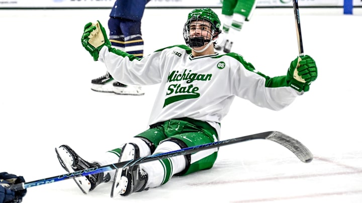 Michigan State's Porter Martone celebrates his empty net goal against Notre Dame during the third period on Thursday, Feb. 19, 2026, at the Munn Ice Arena in East Lansing.