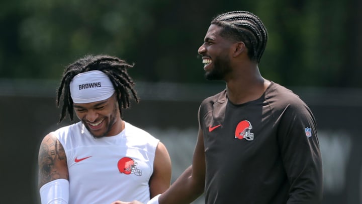 Browns quarterback Shedeur Sanders (right) chats with wide receiver Gage Larvadain after practice, Tuesday, June 10, 2025, in Berea.