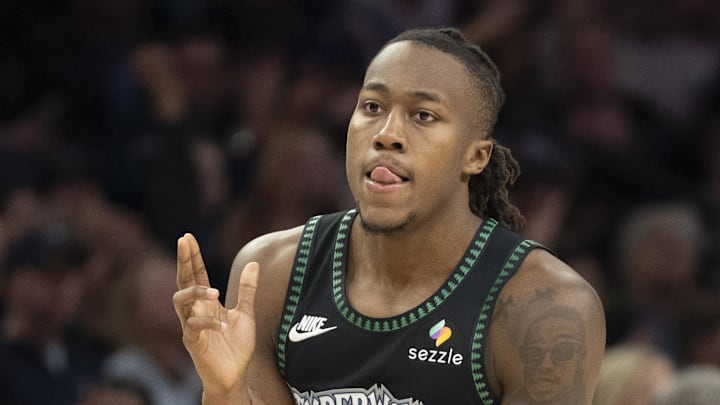 Mar 5, 2026; Minneapolis, Minnesota, USA; Minnesota Timberwolves guard Ayo Dosunmu (13) celebrates making a shot against the Toronto Raptors in the second half at Target Center. Mandatory Credit: Jesse Johnson-Imagn Images