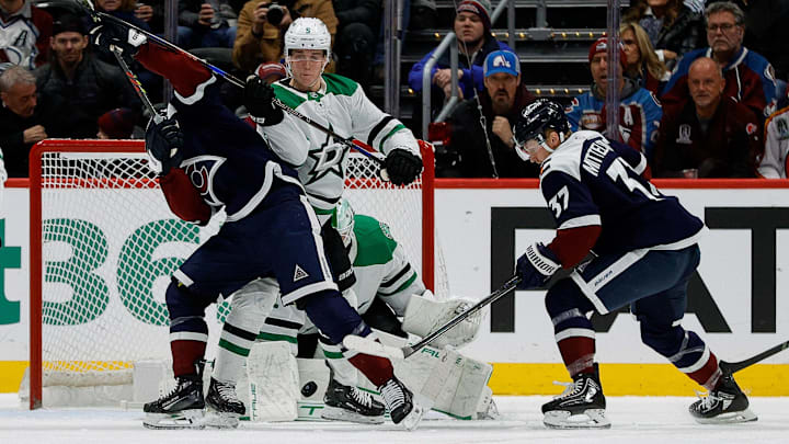 Jan 18, 2025; Denver, Colorado, USA; Colorado Avalanche left wing Artturi Lehkonen (62) and Dallas Stars defenseman Nils Lundkvist (5) battle for position ahead of Dallas Stars goaltender Casey DeSmith (1) as center Casey Mittelstadt (37) defends in the first period at Ball Arena. Mandatory Credit: Isaiah J. Downing-Imagn Images