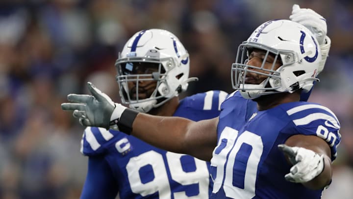 Indianapolis Colts defensive tackle Grover Stewart (90) and Indianapolis Colts defensive tackle DeForest Buckner (99) react after a play Sunday, Sept. 12, 2021, during the regular season opener against the Seattle Seahawks at Lucas Oil Stadium in Indianapolis. Indianapolis Colts defensive tackle Grover Stewart (90) and Indianapolis Colts defensive tackle DeForest Buckner (99) react after a play Sunday, Sept. 12, 2021, during the regular season opener against the Seattle Seahawks at Lucas Oil Stadium in Indianapolis.