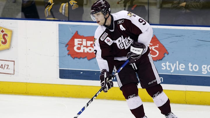December 5, 2008; Kingston, ON, CANADA; Peterborough Petes forward Zack Kassian (9) caries the puck against the Kingston Frontenac during a game against the Peterborough Petes at the KROC Centre. Mandatory Credit: John E. Sokolowski-Imagn Images December 5, 2008; Kingston, ON, CANADA; Peterborough Petes forward Zack Kassian (9) caries the puck against the Kingston Frontenac during a game against the Peterborough Petes at the KROC Centre. Mandatory Credit: John E. Sokolowski-Imagn Images