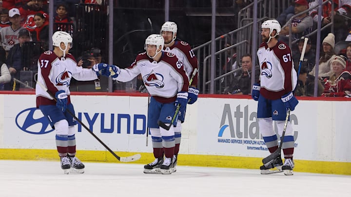 Dec 8, 2024; Newark, New Jersey, USA; Colorado Avalanche left wing Artturi Lehkonen (62) celebrates his goal against the New Jersey Devils during the second period at Prudential Center. Mandatory Credit: Ed Mulholland-Imagn Images