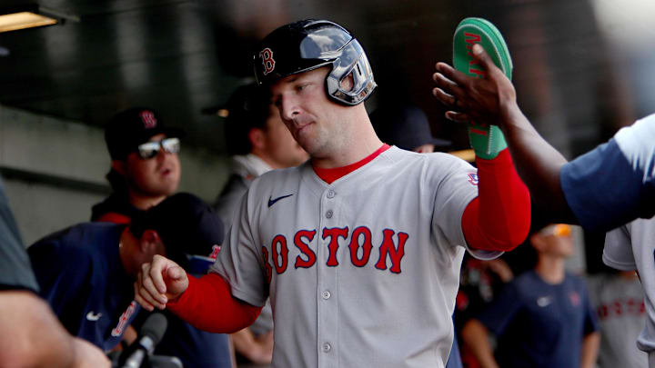 Sep 10, 2025; West Sacramento, California, USA; Boston Red Sox third baseman Alex Bregman (2) is congratulated by teammates after scoring a run against the Athletics during the third inning at Sutter Health Park. Mandatory Credit: Dennis Lee-Imagn Images