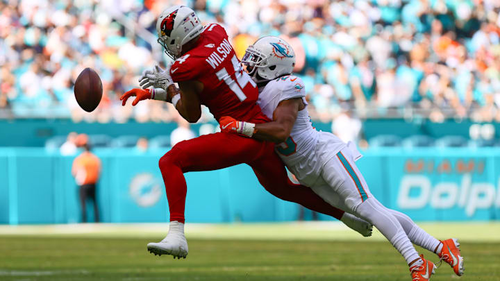 Oct 27, 2024; Miami Gardens, Florida, USA; Miami Dolphins cornerback Kendall Fuller (29) breaks a pass intended to Arizona Cardinals wide receiver Michael Wilson (14) during the second quarter at Hard Rock Stadium. Oct 27, 2024; Miami Gardens, Florida, USA; Miami Dolphins cornerback Kendall Fuller (29) breaks a pass intended to Arizona Cardinals wide receiver Michael Wilson (14) during the second quarter at Hard Rock Stadium.