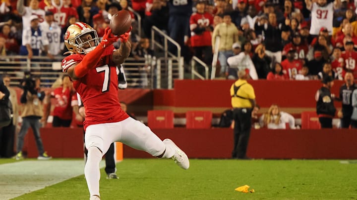 Oct 27, 2024; Santa Clara, California, USA; San Francisco 49ers cornerback Charvarius Ward (7) attempts to gather the ball on a Dallas Cowboys incomplete pass during the fourth quarter at Levi's Stadium. Mandatory Credit: Kelley L Cox-Imagn Images