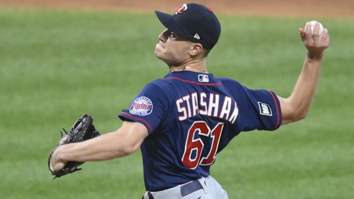 Apr 27, 2021; Cleveland, Ohio, USA; Minnesota Twins relief pitcher Cody Stashak (61) delivers in the seventh inning against the Cleveland Indians at Progressive Field