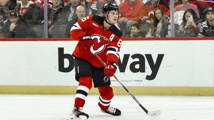 Feb 24, 2024; Newark, New Jersey, USA; New Jersey Devils center Jack Hughes (86) passes the puck