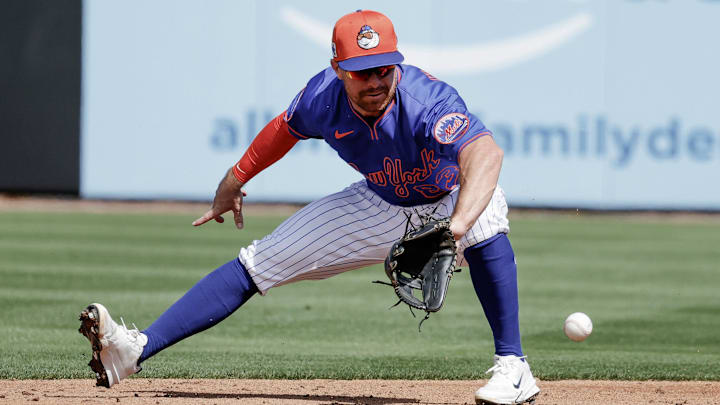 Feb 23, 2025; Port St. Lucie, Florida, USA;  New York Mets infielder Donovan Walton fields a ground ball during the third inning against the Miami Marlins at Clover Park. Mandatory Credit: Reinhold Matay-Imagn Images