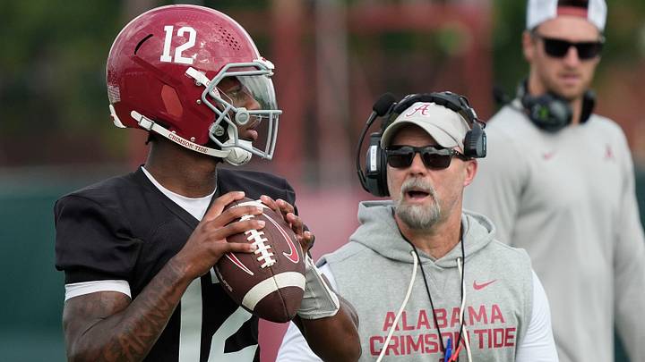 July 30, 2025; Tuscaloosa, AL, USA; Quarterback Keelon Russell drops back under the watch of offensive coordinator Ryan Grubb during the first practice session of the preseason for the Alabama Crimson Tide.