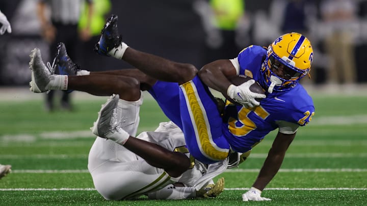 Nov 22, 2025; Atlanta, Georgia, USA; Pittsburgh Panthers running back Ja'Kyrian Turner (25) runs the ball against the Georgia Tech Yellow Jackets in the fourth quarter at Bobby Dodd Stadium at Hyundai Field. Mandatory Credit: Brett Davis-Imagn Images