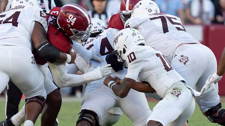 Oct 24, 2026; Tuscaloosa, AL, USA;  Texas A&M quarterback Marcel Reed (10) muffs a snap, allowing Alabama to recover the fumble at Saban Field at Bryant Denny Stadium. Alabama defeated Texas A&M 31-20. Mandatory Credit: Gary Cosby Jr.-Tuscaloosa News