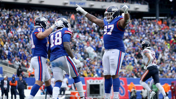 New York Giants defensive lineman Dexter Lawrence (97) celebrates against the Bears in their last matchup in 2022.