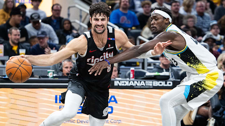 Nov 27, 2024; Indianapolis, Indiana, USA; Portland Trail Blazers forward Deni Avdija (8) dribbles  the ball while Indiana Pacers forward Pascal Siakam (43) defends in the second half at Gainbridge Fieldhouse. Mandatory Credit: Trevor Ruszkowski-Imagn Images