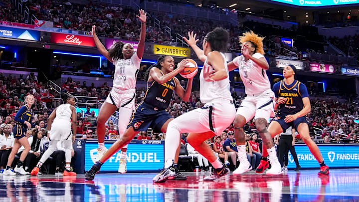 Indiana Fever guard Kelsey Mitchell (0) runs a play Thursday, July 3, 2025, during a game between the Indiana Fever and the Las Vegas Aces at Gainbridge Fieldhouse in Indianapolis. The Indiana Fever defeated the Las Vegas Aces, 81-54. Indiana Fever guard Kelsey Mitchell (0) runs a play Thursday, July 3, 2025, during a game between the Indiana Fever and the Las Vegas Aces at Gainbridge Fieldhouse in Indianapolis. The Indiana Fever defeated the Las Vegas Aces, 81-54.