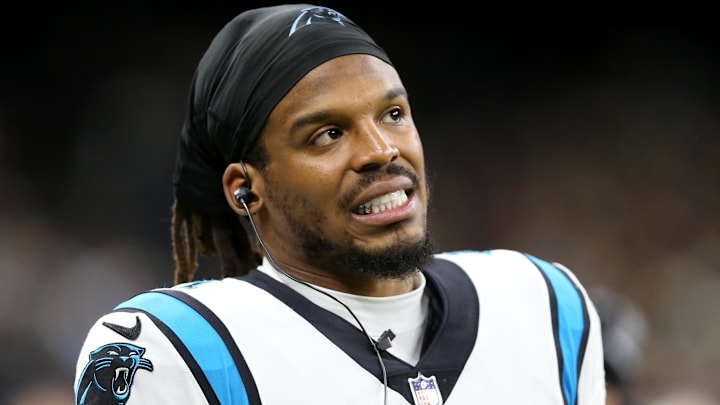 Former Carolina Panthers quarterback Cam Newton (1) on the sidelines in the second quarter against the New Orleans Saints at the Caesars Superdome.