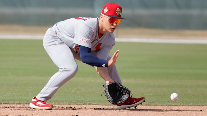 Feb 16, 2026; Jupiter, FL, USA; St. Louis Cardinals infielder JJ Wetherholt (77) fields the ball during spring training workouts at Roger Dean Stadium. Mandatory Credit: Reinhold Matay-Imagn Images Feb 16, 2026; Jupiter, FL, USA; St. Louis Cardinals infielder JJ Wetherholt (77) fields the ball during spring training workouts at Roger Dean Stadium. Mandatory Credit: Reinhold Matay-Imagn Images