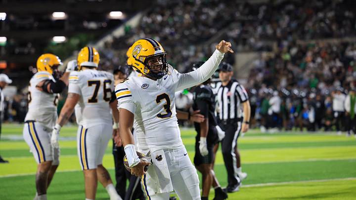 Dec 24, 2025; Honolulu, HI, USA;  California Golden Bears quarterback Jaron-Keawe Sagapolutele (3) reacts after making a fourth quarter touchdown against the Hawaii Rainbow Warriors at the Hawaii Bowl at the Clarence T.C. Ching Athletics Complex. Mandatory Credit: Marco Garcia-Imagn Images
