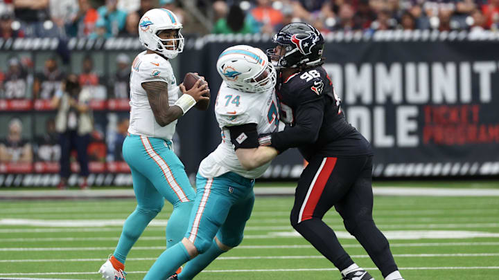 Miami Dolphins quarterback Tua Tagovailoa (1) drops to throw against the Houston Texans in the second quarter at NRG Stadium.