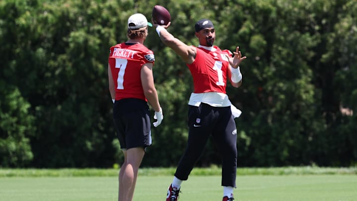May 30, 2024; Philadelphia, PA, USA; Philadelphia Eagles quarterback Jalen Hurts (1) throws the ball in front of quarterback Kenny Pickett (7) at NovaCare Complex. Mandatory Credit: Bill Streicher-USA TODAY Sports
