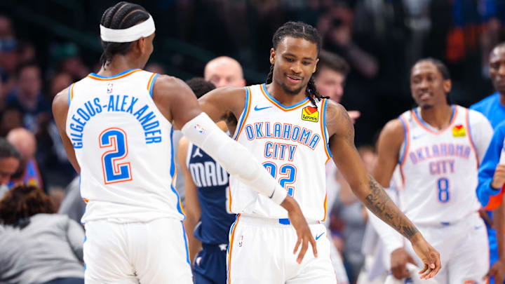 May 11, 2024; Dallas, Texas, USA; Oklahoma City Thunder guard Cason Wallace (22) celebrates with Oklahoma City Thunder guard Shai Gilgeous-Alexander (2) after scoring during the first half against the Dallas Mavericks during game three of the second round for the 2024 NBA playoffs at American Airlines Center. Mandatory Credit: Kevin Jairaj-Imagn Images