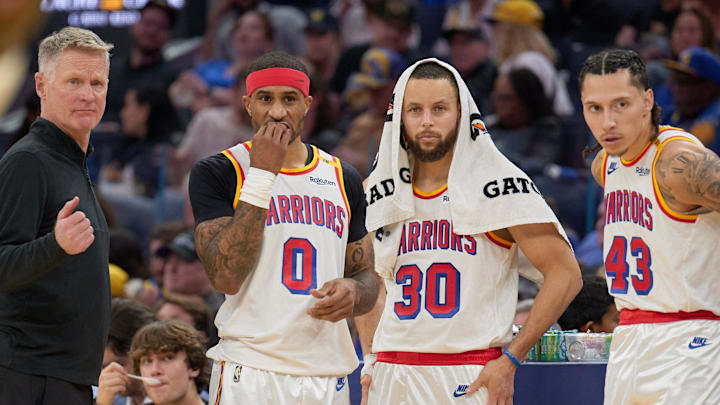 Jan 18, 2025; San Francisco, California, USA; Golden State Warriors head coach Steve Kerr, guard Gary Payton II (0), guard Stephen Curry (30) and forward Lindy Waters III (43) during a timeout against the Washington Wizards during the third quarter at Chase Center. Mandatory Credit: Robert Edwards-Imagn Images Jan 18, 2025; San Francisco, California, USA; Golden State Warriors head coach Steve Kerr, guard Gary Payton II (0), guard Stephen Curry (30) and forward Lindy Waters III (43) during a timeout against the Washington Wizards during the third quarter at Chase Center. Mandatory Credit: Robert Edwards-Imagn Images