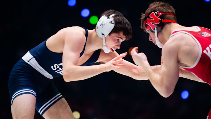 Penn State's Luke Lilledahl, left, wrestles Nebraska's Alan Koehler in the 125-pound bout during a Big Ten dual meet.